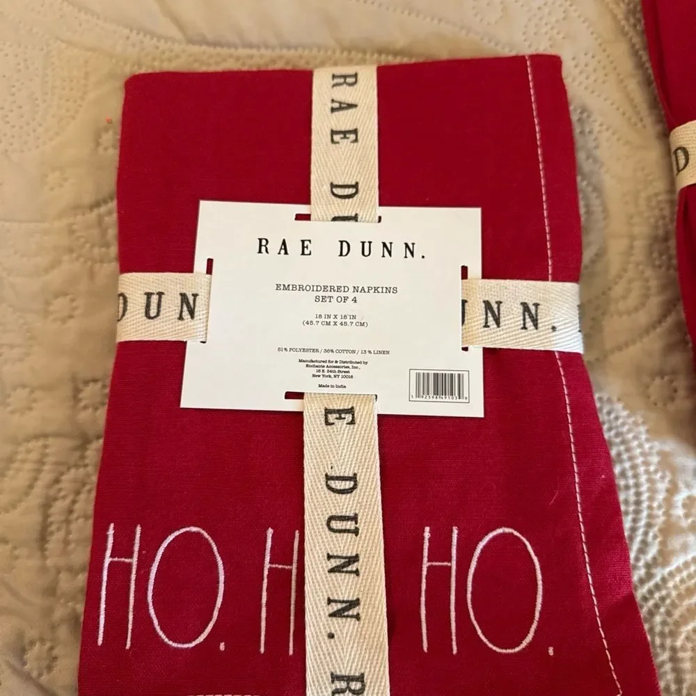 Rae Dunn embroidered holiday napkins. Noel, Peace, Merry and HoHoHo- red
